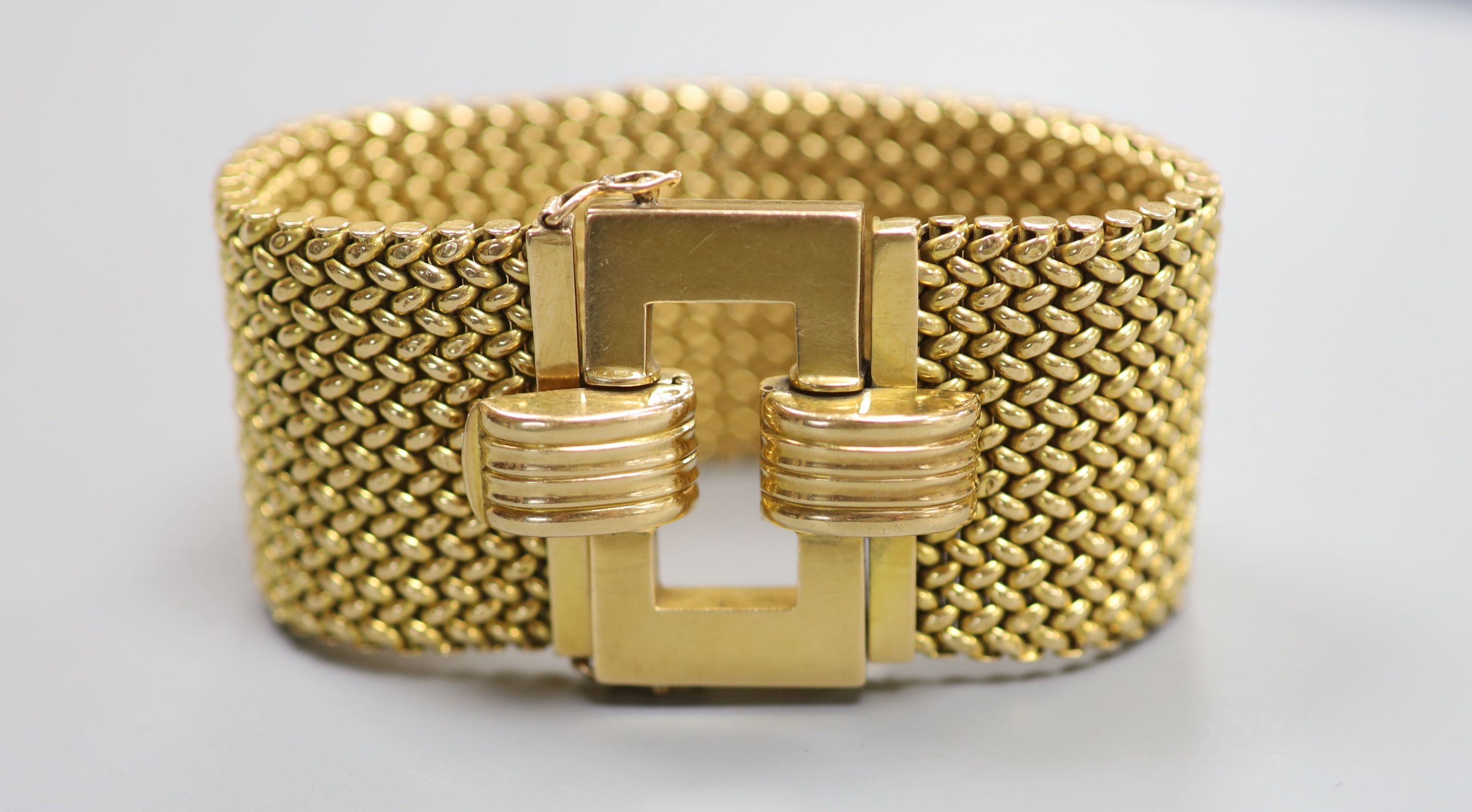 A mid 20th century Italian 750 yellow metal woven link bracelet